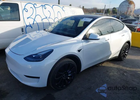 2022 Tesla Model Y Performance Dual Motor All-Wheel Drive z USA, uszkodzony, nr VIN 7SAYGDEF0NF493323